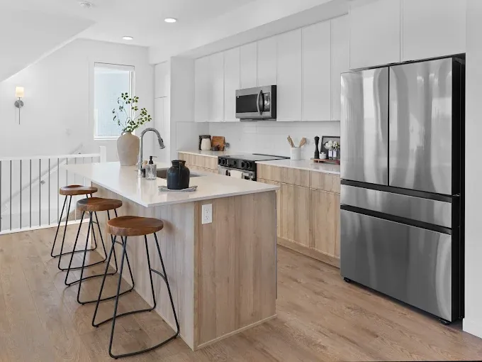 Bright, freshly painted kitchen with white walls