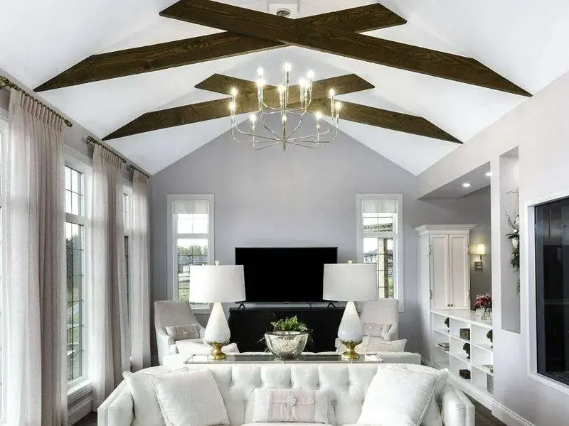 Bright living room with vaulted ceiling and freshly painted walls